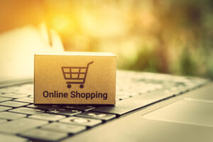 online shopping with box and laptop