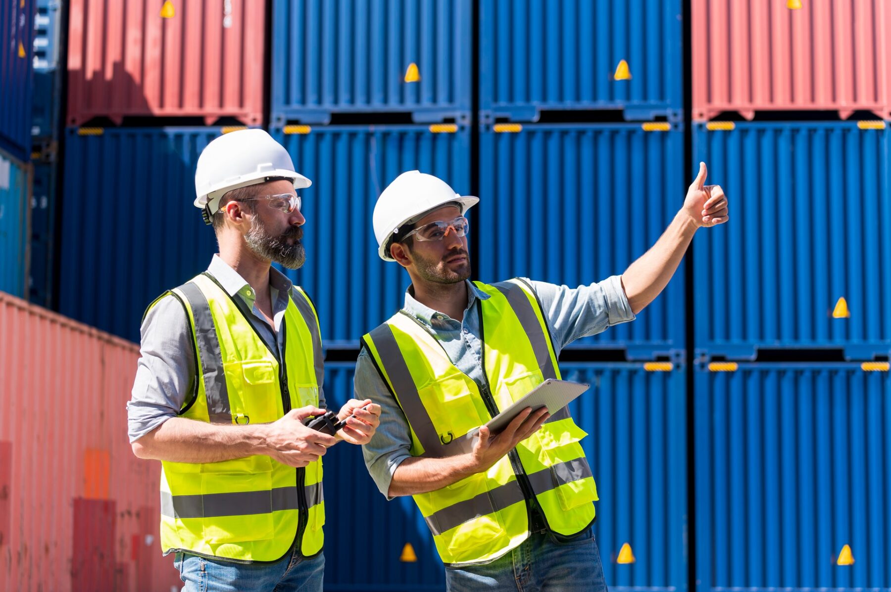 Logistics,Engineer,And,Inspector,Working,Togetter,And,Discussing,In,Shipping